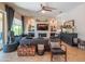 Stylish living area with custom built-ins, a cozy fireplace, and contemporary decor creates a relaxing atmosphere at 26333 W Vista North Dr, Buckeye, AZ 85396