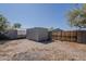 Backyard area with shed and fencing on gravel at 2853 W Ohio St, Apache Junction, AZ 85120