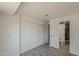 This bedroom features wood-look flooring and a closet with sliding doors at 2853 W Ohio St, Apache Junction, AZ 85120