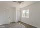 This bedroom has wood-look flooring and access to a closet at 2853 W Ohio St, Apache Junction, AZ 85120