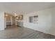 Open-concept living space showcasing modern flooring and plenty of natural light at 2853 W Ohio St, Apache Junction, AZ 85120