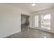 Bright living room featuring stylish flooring and a doorway, providing a welcoming ambiance at 2853 W Ohio St, Apache Junction, AZ 85120
