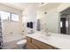 Bright bathroom with a shower-tub combo, vanity, and neutral finishes at 2963 S 83Rd St, Mesa, AZ 85212