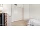 Bedroom showcasing closet with double doors and neutral carpet at 2963 S 83Rd St, Mesa, AZ 85212