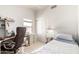 Bedroom featuring a desk, a closet and a twin bed at 2963 S 83Rd St, Mesa, AZ 85212