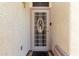 Close-up of the front door of the home, with an ornate security screen at 2963 S 83Rd St, Mesa, AZ 85212