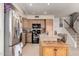 Bright kitchen with stainless steel appliances and an island with seating at 2963 S 83Rd St, Mesa, AZ 85212