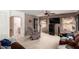 This is a cozy living room with a ceiling fan, brown couches, a TV, and an archway at 2963 S 83Rd St, Mesa, AZ 85212