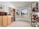 This living area features two large windows, a bookshelf, and beige carpet at 2963 S 83Rd St, Mesa, AZ 85212
