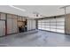 Spacious garage with ample built-in storage cabinets and epoxy flooring at 312 S Hardy Dr # 106, Tempe, AZ 85281