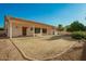 Large backyard with a covered patio offers a great space for outdoor activities and entertaining guests at 3622 W Barcelona Dr, Chandler, AZ 85226