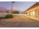 Large backyard with potential for customization, featuring a covered patio and ample space for recreation at 3622 W Barcelona Dr, Chandler, AZ 85226