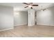 Spacious living area with tile flooring, a ceiling fan, and neutral paint, ready for customization at 3622 W Barcelona Dr, Chandler, AZ 85226