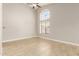 Bright living room featuring tile flooring, high ceilings, and large windows for natural light at 3622 W Barcelona Dr, Chandler, AZ 85226