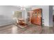Open-concept living area with hardwood floors, natural light, and views of the backyard at 36645 W Bilbao St, Maricopa, AZ 85138