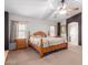 Cozy main bedroom featuring a spacious layout with ample natural light and stylish decor at 36645 W Bilbao St, Maricopa, AZ 85138