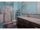 Bright bathroom featuring a glass shower, granite countertops, decorative backsplash, and modern fixtures at 3907 E Carob Dr, Gilbert, AZ 85298