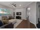 Spacious living room with tile floors, a ceiling fan, large windows and comfortable seating at 3907 E Carob Dr, Gilbert, AZ 85298