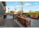 Enjoy the outdoor living space with comfortable seating and a built-in BBQ grill, ideal for entertaining at 3907 E Carob Dr, Gilbert, AZ 85298