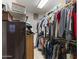 Spacious walk-in closet with ample storage for clothes and accessories at 45722 W Barbara Ln, Maricopa, AZ 85139