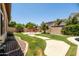 Spacious backyard with a custom BBQ area, perfect for outdoor gatherings and relaxing in your own private oasis at 4614 E Reins Rd, Gilbert, AZ 85297