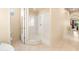 Modern bathroom with a glass-enclosed shower and neutral tones at 4614 E Reins Rd, Gilbert, AZ 85297