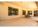 Charming covered patio with a view of the surrounding landscape, perfect for enjoying outdoor meals and relaxation at 4614 E Reins Rd, Gilbert, AZ 85297