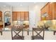 Gourmet kitchen features granite countertops, tile backsplash and stainless appliances at 4614 E Reins Rd, Gilbert, AZ 85297