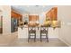 Large kitchen includes stainless appliances, dual islands and seating at the breakfast bar at 4614 E Reins Rd, Gilbert, AZ 85297