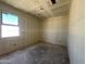 Bright, spacious bedroom during construction; awaiting customization for a modern feel at 47437 W Kenner Dr, Maricopa, AZ 85139