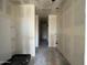 Hallway showcasing the home's layout and design, leading to other rooms at 47437 W Kenner Dr, Maricopa, AZ 85139