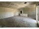 Spacious, open-concept living room during construction, ready for personalized finishing touches at 47437 W Kenner Dr, Maricopa, AZ 85139