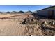 Foundation preparation with rebar grid and wooden framework, showcasing the building process at 47705 W Kenner Dr, Maricopa, AZ 85139