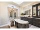 Elegant bathroom features a freestanding tub, decorative lighting, and luxurious vanity area at 5700 E Sanna St, Paradise Valley, AZ 85253