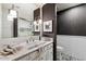 Elegant bathroom with marble countertop, decorative tile flooring, and a sleek glass-enclosed shower at 5700 E Sanna St, Paradise Valley, AZ 85253