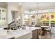 Bright, modern kitchen with a farmhouse sink and views of outdoor dining at 5700 E Sanna St, Paradise Valley, AZ 85253
