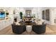 Stunning living room with wet bar, fireplace, and coffered ceilings at 5700 E Sanna St, Paradise Valley, AZ 85253