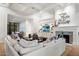 Bright living room with a large fireplace and custom built-in shelving at 5700 E Sanna St, Paradise Valley, AZ 85253
