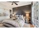 Serene bedroom features a textured accent wall, French doors, and neutral tones for a calming retreat at 5700 E Sanna St, Paradise Valley, AZ 85253