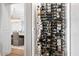 Wine cellar with custom shelving and modern lighting at 5700 E Sanna St, Paradise Valley, AZ 85253
