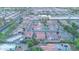 Expansive aerial view of a residential neighborhood featuring tile roofs and several homes with private pools at 5941 S Cambridge St, Chandler, AZ 85249