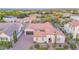 Sprawling home with lush landscaping, putting green, and solar panels, showcasing a perfect blend of luxury and sustainability at 5941 S Cambridge St, Chandler, AZ 85249