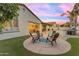 Relaxing backyard with outdoor seating, grill, and pool, perfect for entertaining or enjoying peaceful evenings at 5941 S Cambridge St, Chandler, AZ 85249