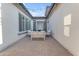 Charming outdoor patio with string lights creating an inviting space for relaxation and entertainment at 5941 S Cambridge St, Chandler, AZ 85249