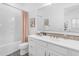 Bathroom showcases a vanity with framed mirror, attractive backsplash, and shower-tub combination at 5941 S Cambridge St, Chandler, AZ 85249