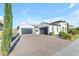 A two-car garage home with a lovely desert-scape yard and stone driveway at 5941 S Cambridge St, Chandler, AZ 85249