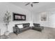 Contemporary living room featuring a stylish sofa, rug, and modern decor at 5941 S Cambridge St, Chandler, AZ 85249