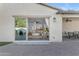 View of an open patio area that flows directly into the living room with large sliding glass doors at 5941 S Cambridge St, Chandler, AZ 85249