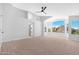 Spacious bedroom with high ceilings, neutral carpet, and large windows offering bright natural light at 641 W Oriole Way, Chandler, AZ 85286