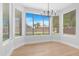 Cozy dining area with large windows providing ample natural light and a view of the backyard at 641 W Oriole Way, Chandler, AZ 85286